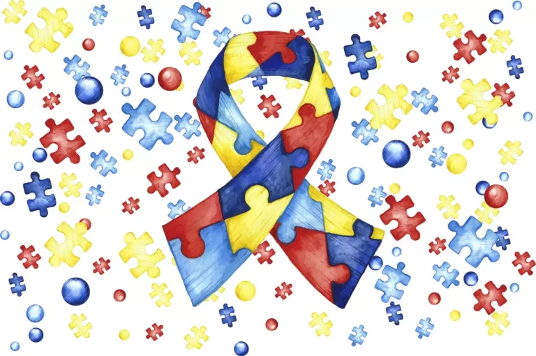 A arte está cheia de quebra-cabeças coloridos e uma faixa no centro, ícone do orgulho autista